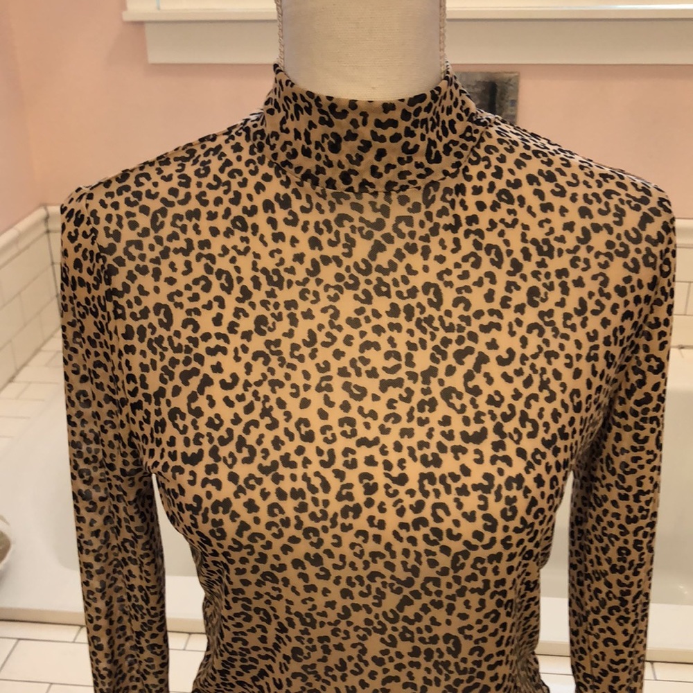 AFRM Mock turtleneck in tan and black leopard pattern size large